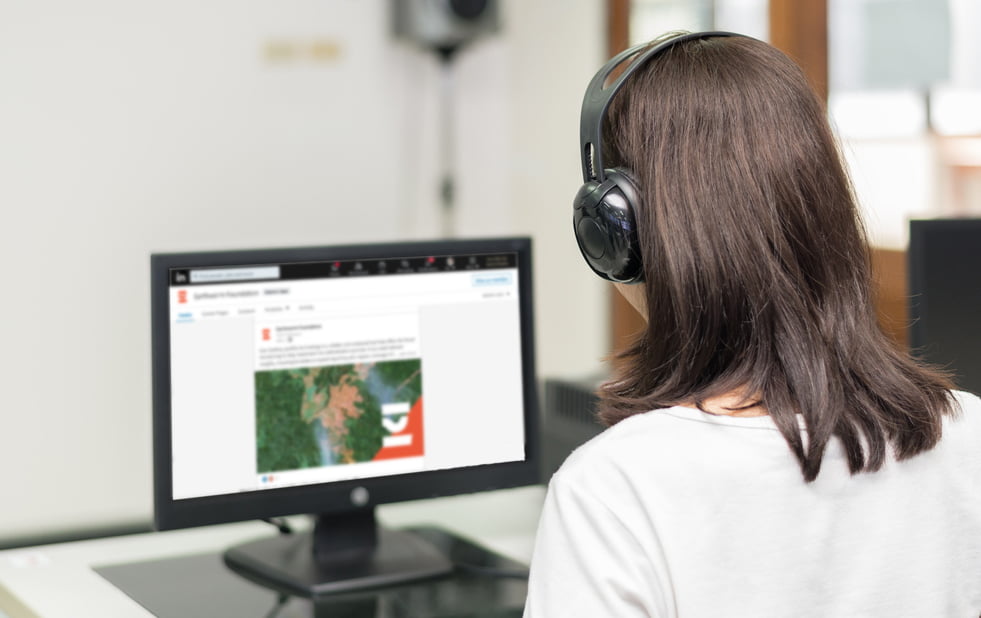 woman looking at earthworm linkedin post