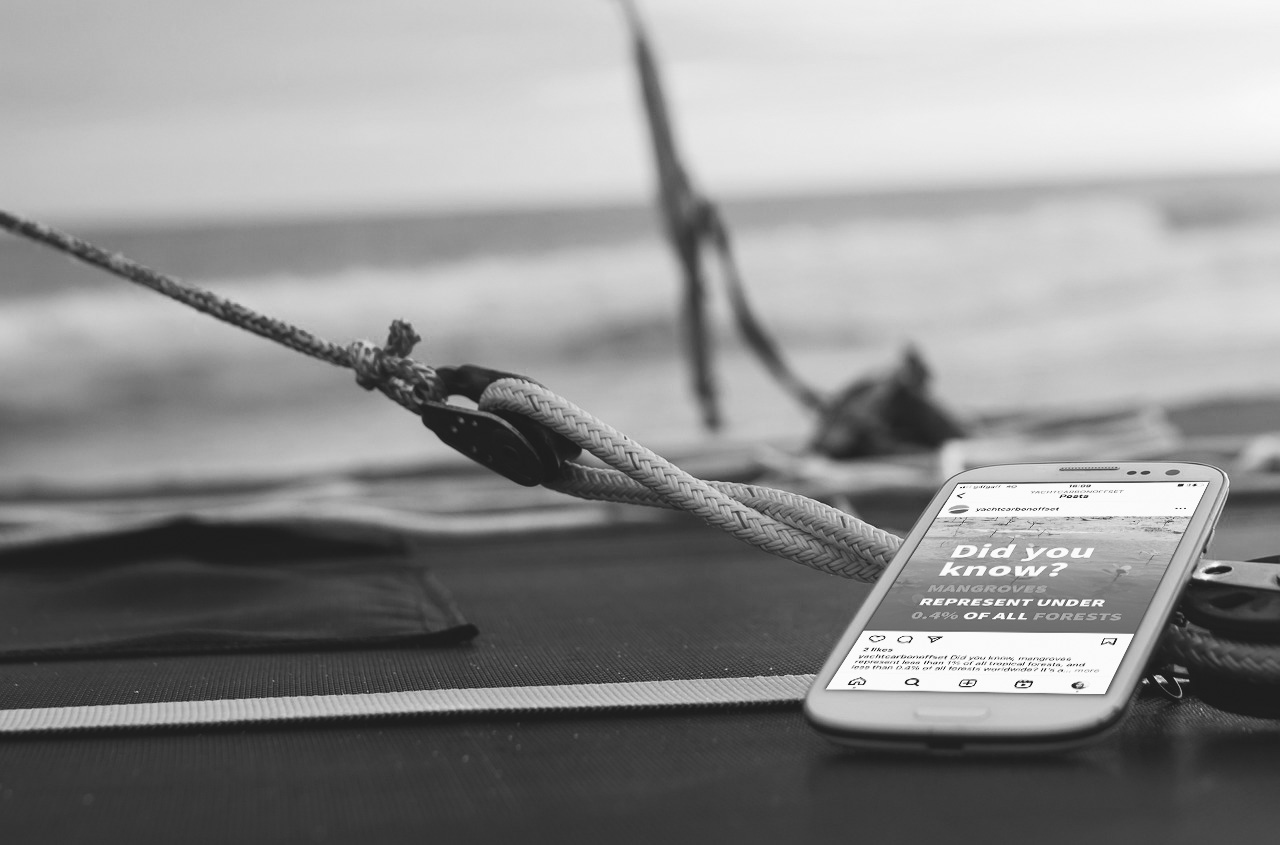jpink marketing services in action on a mobile phone on a boat at sea